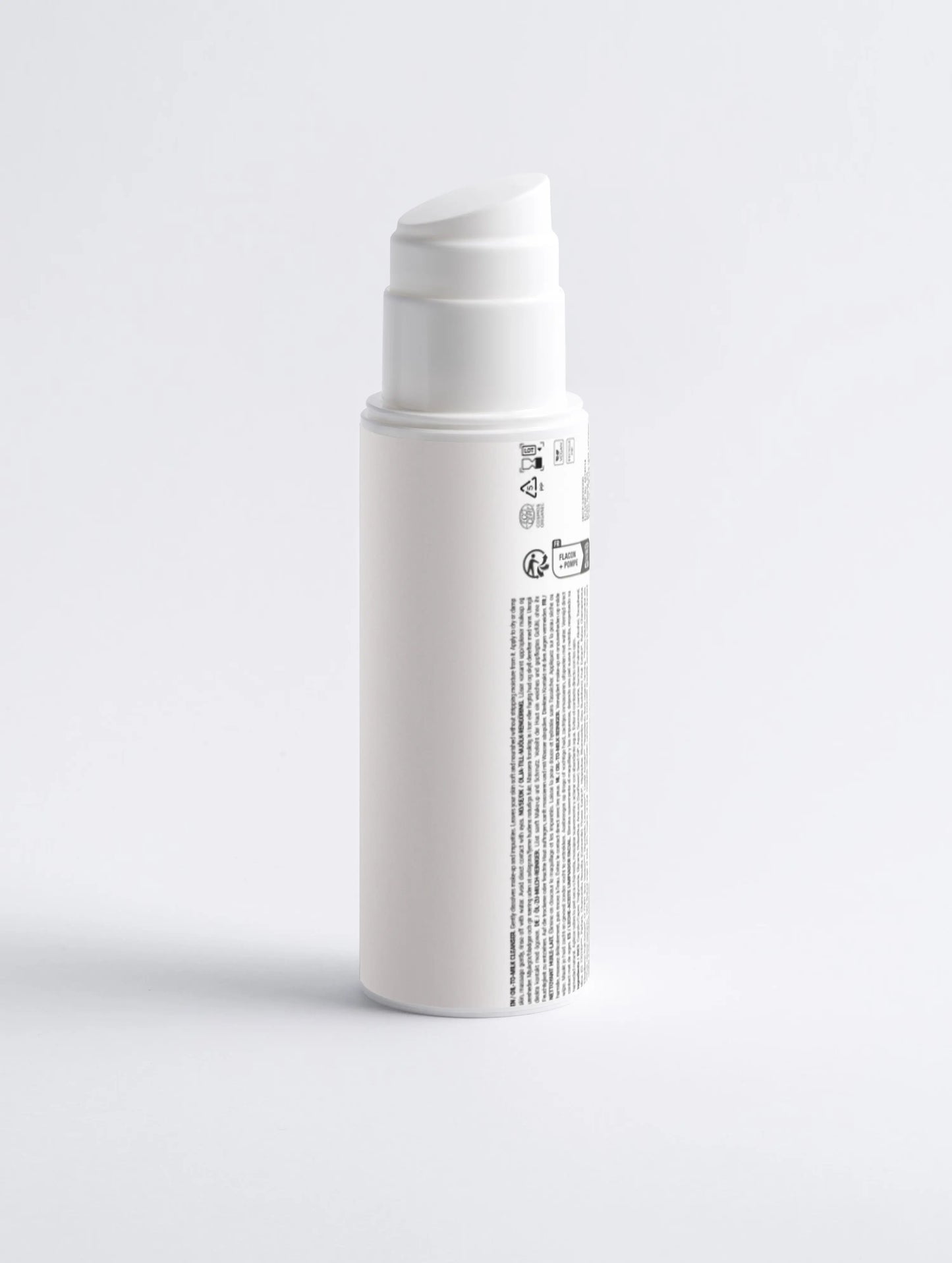 White pump cleanser bottle, back label view for oil-to-milk cleanser