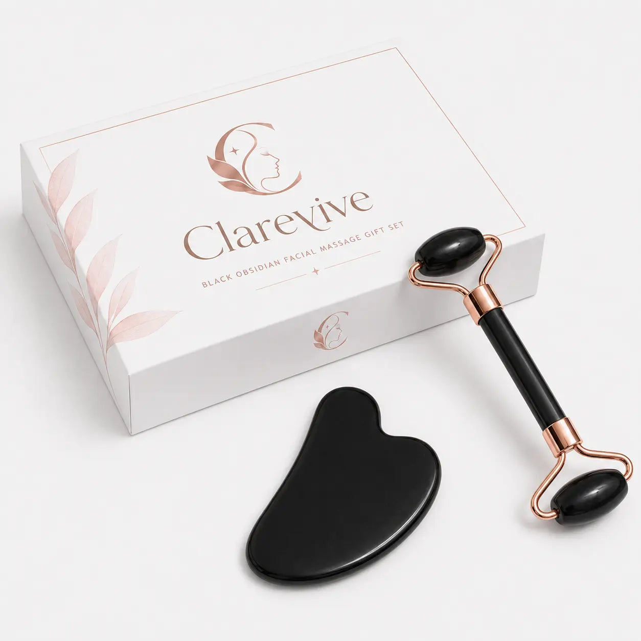 Black gua sha and facial roller set with dark stone rollers