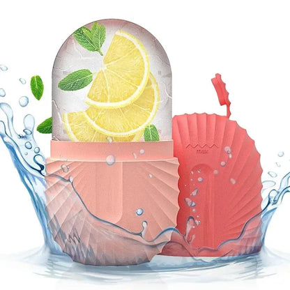 Silicone ice facial roller with coral silicone body and lemon slice ice dome