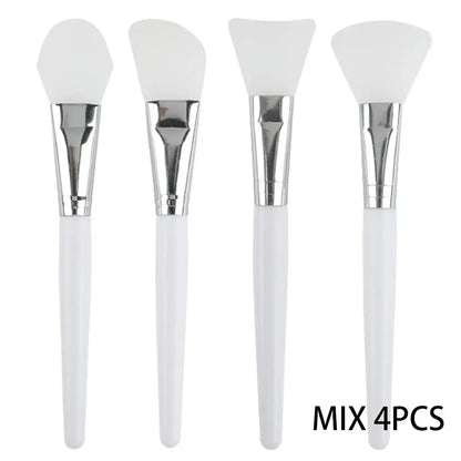 4-piece silicone face mask applicator set with white handles and soft triangular brush heads