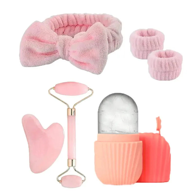Pink ice facial roller set with gua sha scraper and ice-cube molds