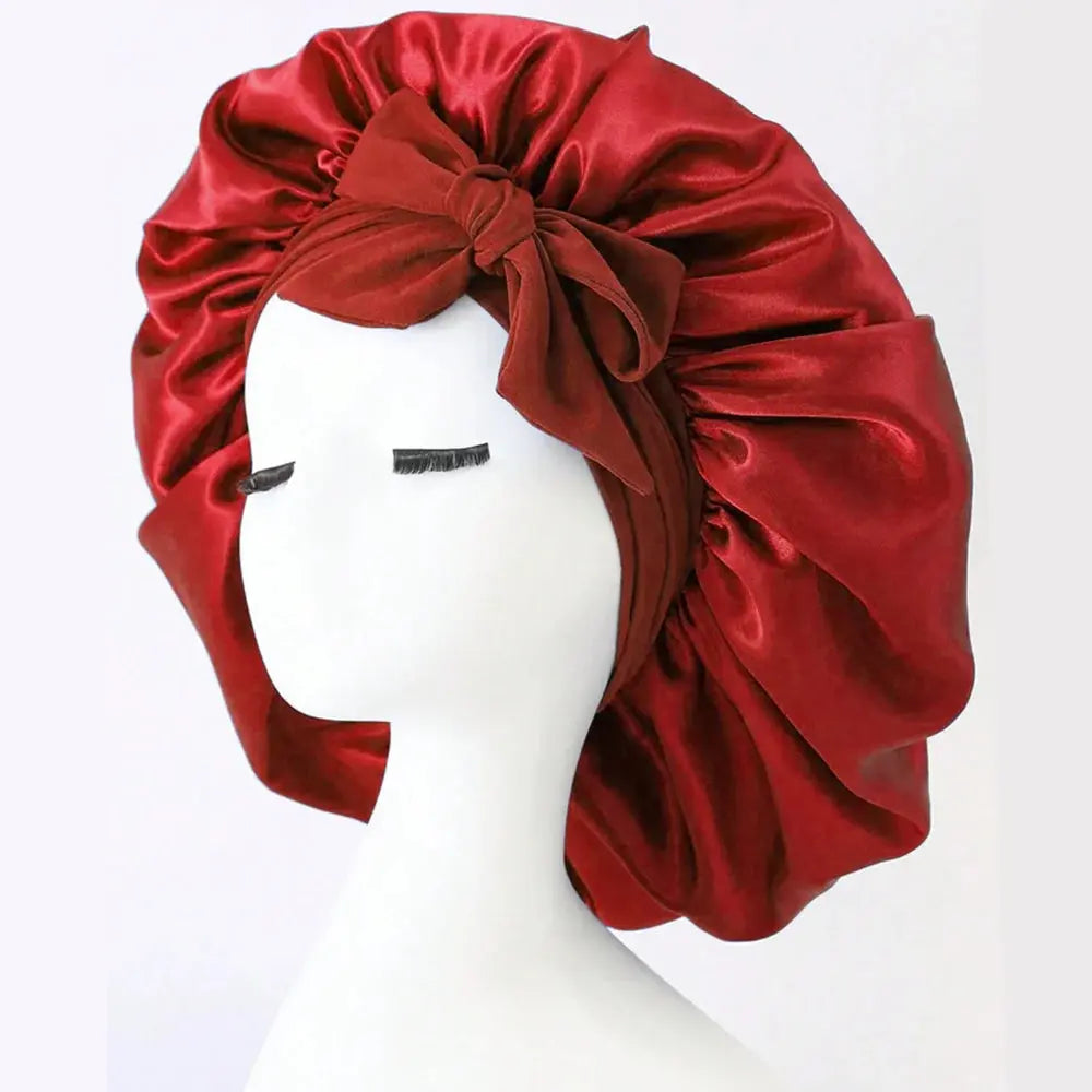 Red satin hair bonnet with gathered crown and side bow tie for sleep