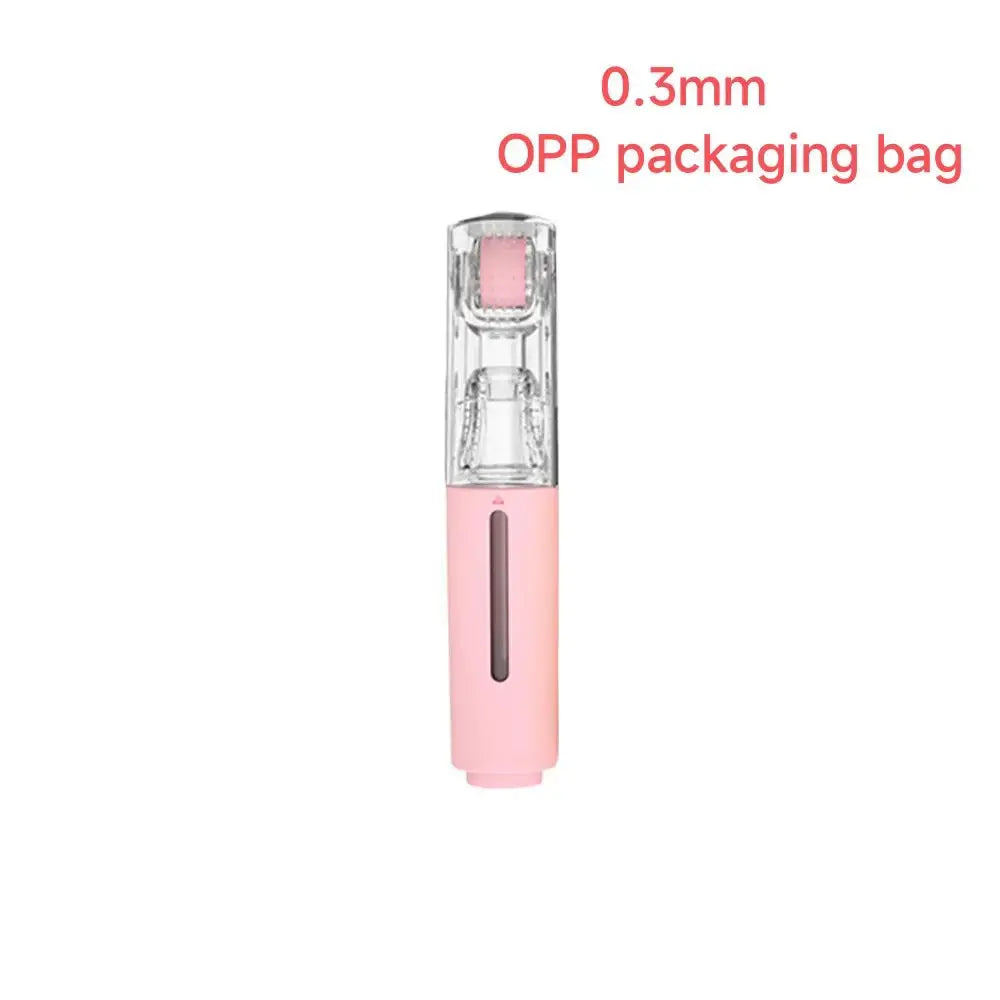 Micro infusion roller beauty device with clear roller chamber and pink body