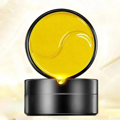 Open eye mask jar filled with glossy yellow gel