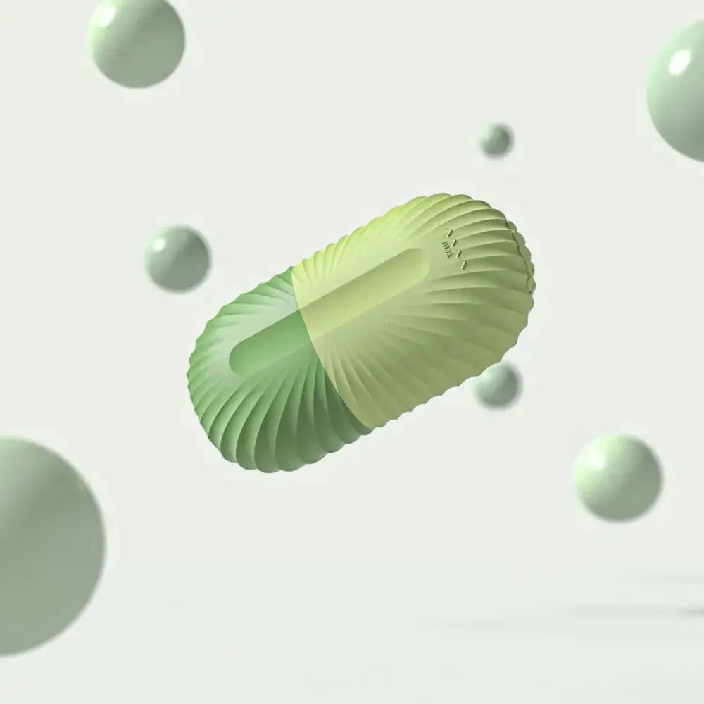 Green silicone ice facial roller close-up with raised grip texture