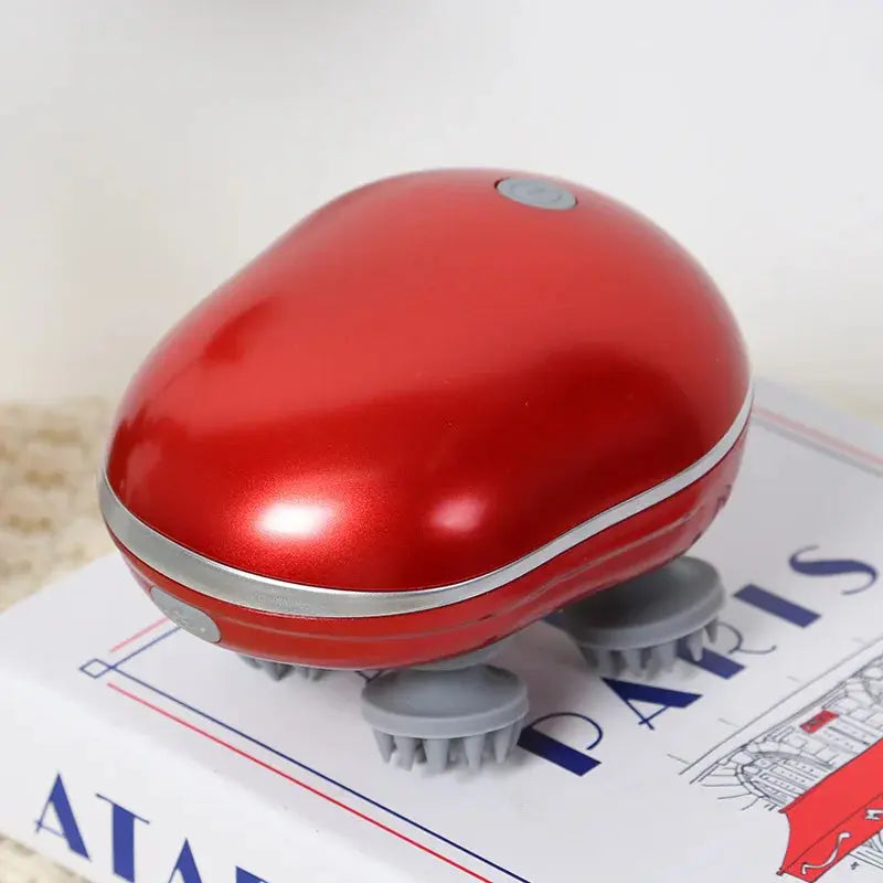 Red scalp massager with dome head and soft silicone kneading nodes