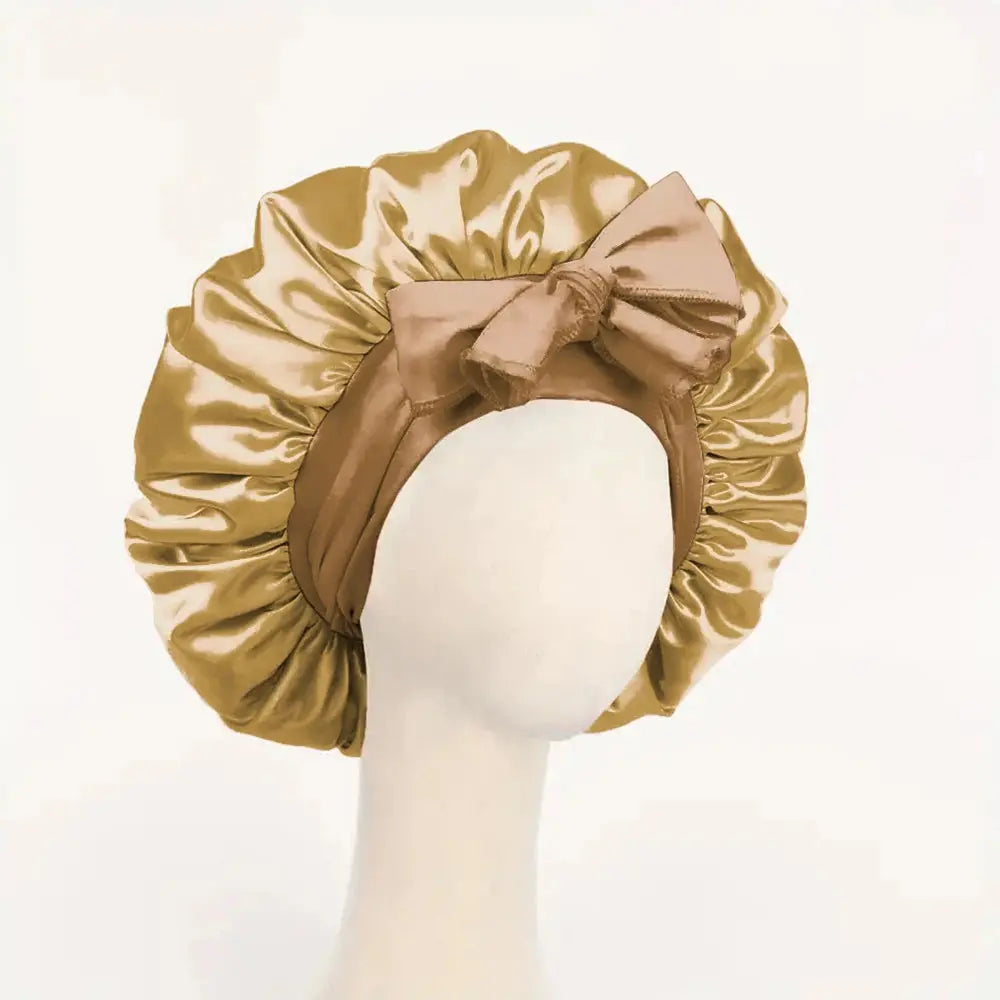 Beige gold satin silk sleep bonnet with ruched ruffle edge and adjustable tie band