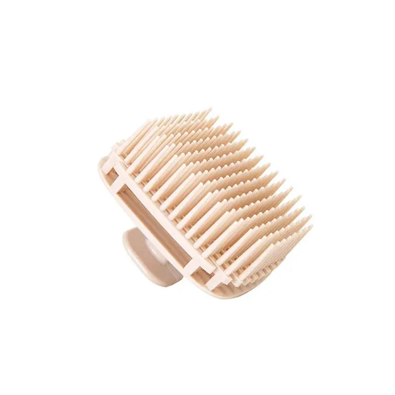 Silicone shampoo scalp massage brush, cream with white bristles and pale pink base