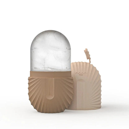 Silicone ice facial roller with beige silicone base and clear cracked ice head