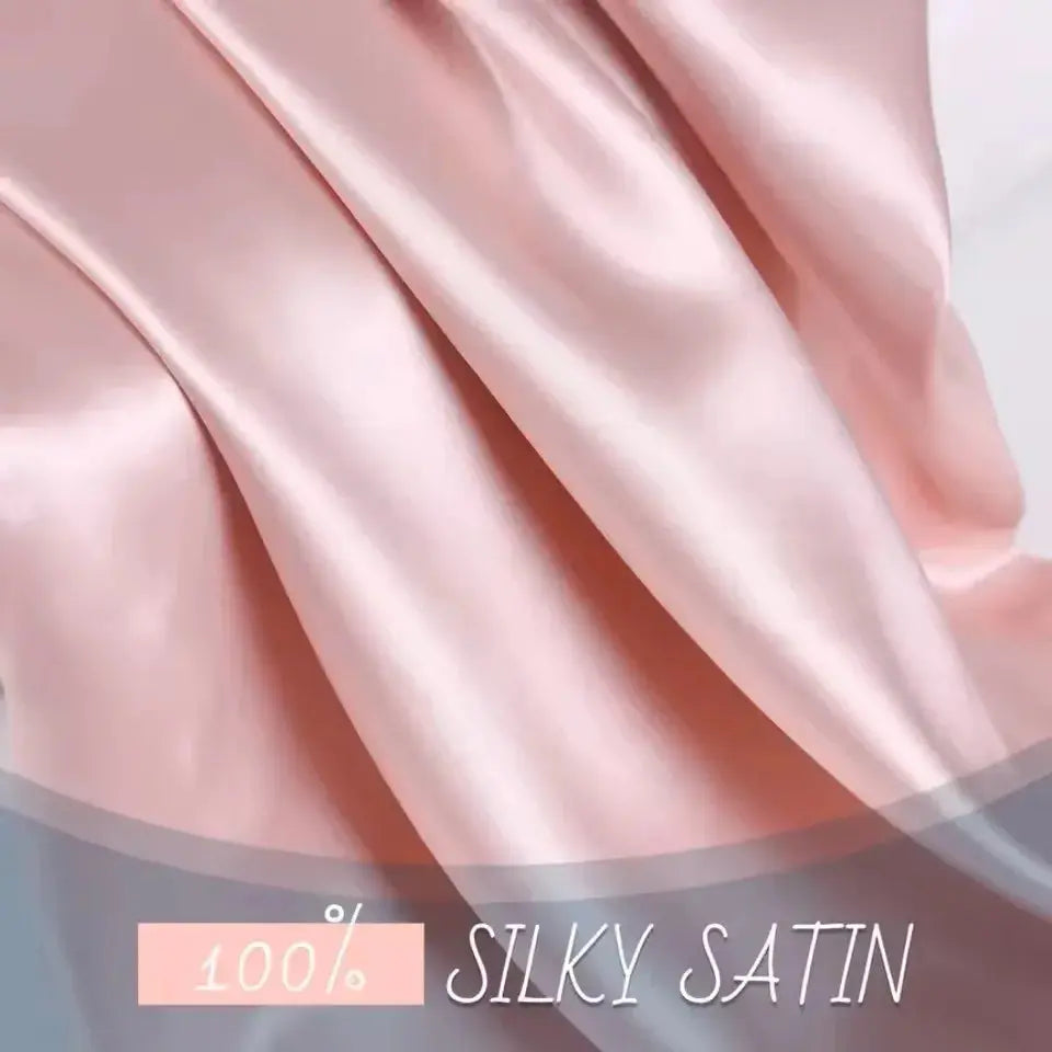 Cherry pink silky satin pillowcase fabric close-up with smooth sheen