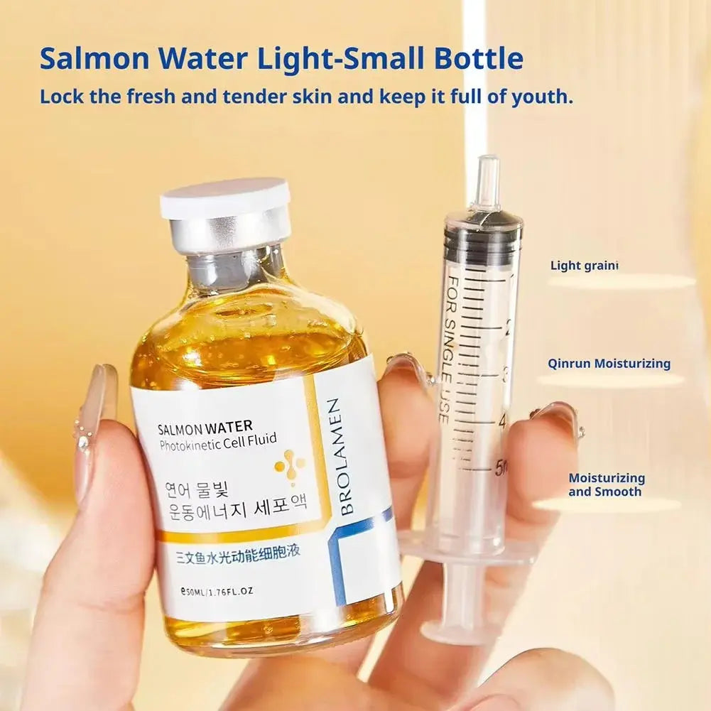 Amber salmon water face serum bottle with syringe-style dropper applicator