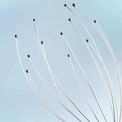 Octopus-style scalp massager metal wire tentacles with small black tips