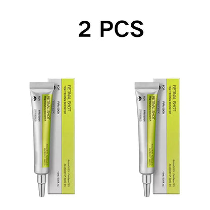 Two-pack skincare cream tubes with green and silver labels on white background
