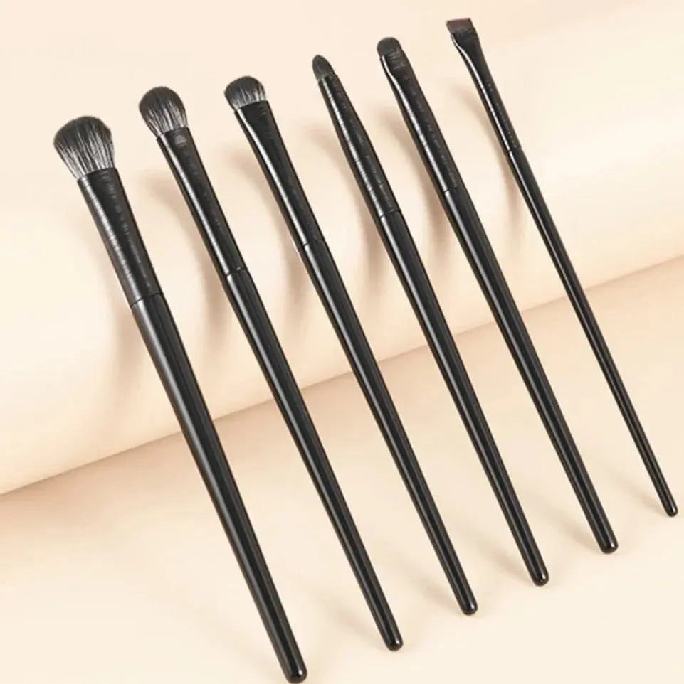 6-piece eye makeup brush set with dark handles and soft bristles, fanned lineup