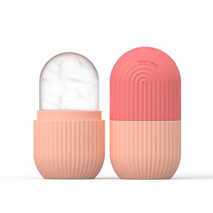 Silicone face ice cube mold, peach ribbed base with arched lid; white gel/ice inside