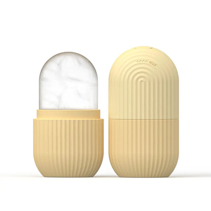 Yellow silicone face ice cube mold with frosty ice top, closed