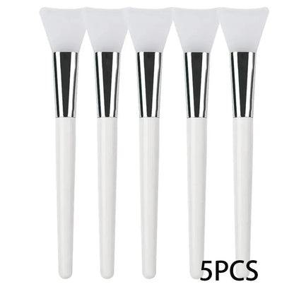 5 silicone face mask applicator brushes with white handles and soft white silicone tips