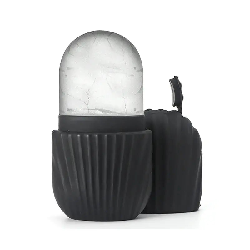 Black silicone ice roller cups with clear ice dome and small accessory