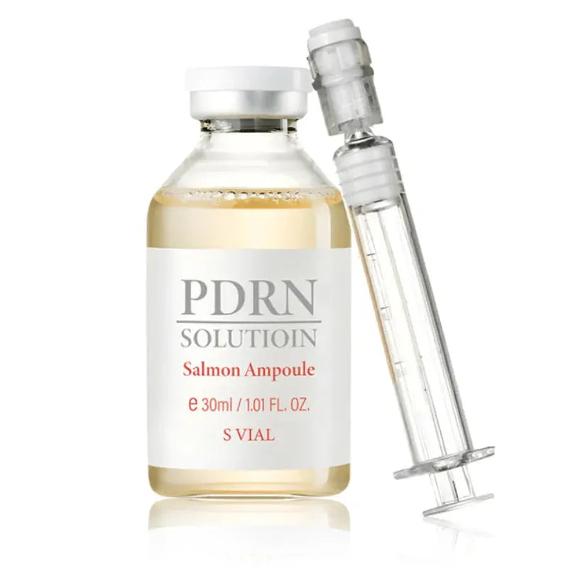Salmon ampoule serum with white bottle and clear dropper-style applicator