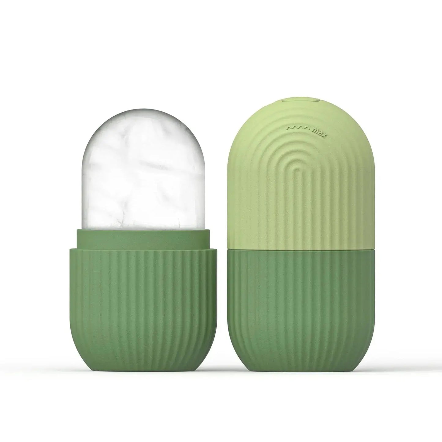 Green silicone face ice cube mold with frosty ice top, closed