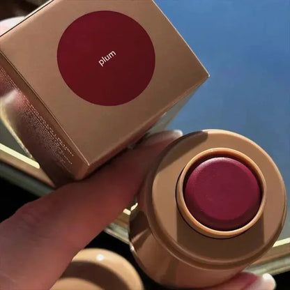 Plum lip glaze pot and shade card labeled “plum”