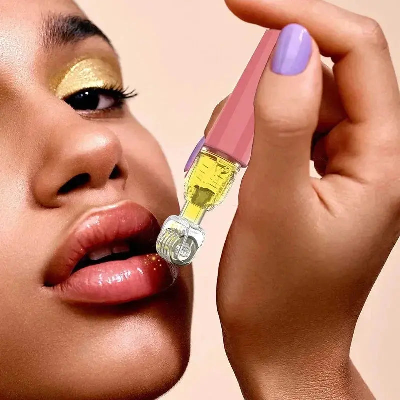 Pink micro infusion roller applicator pen held near the lips for serum application