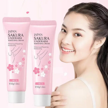 Two pink underarm whitening cream tubes standing side by side