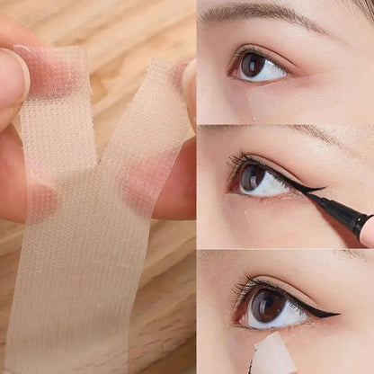 Sheer tape strips applied around eyes to lift and shape