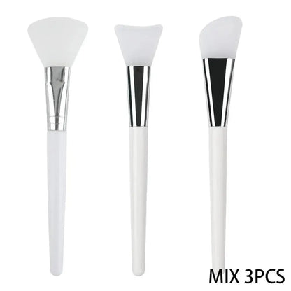 4-piece silicone face mask applicator set with white handles and soft triangular brush heads