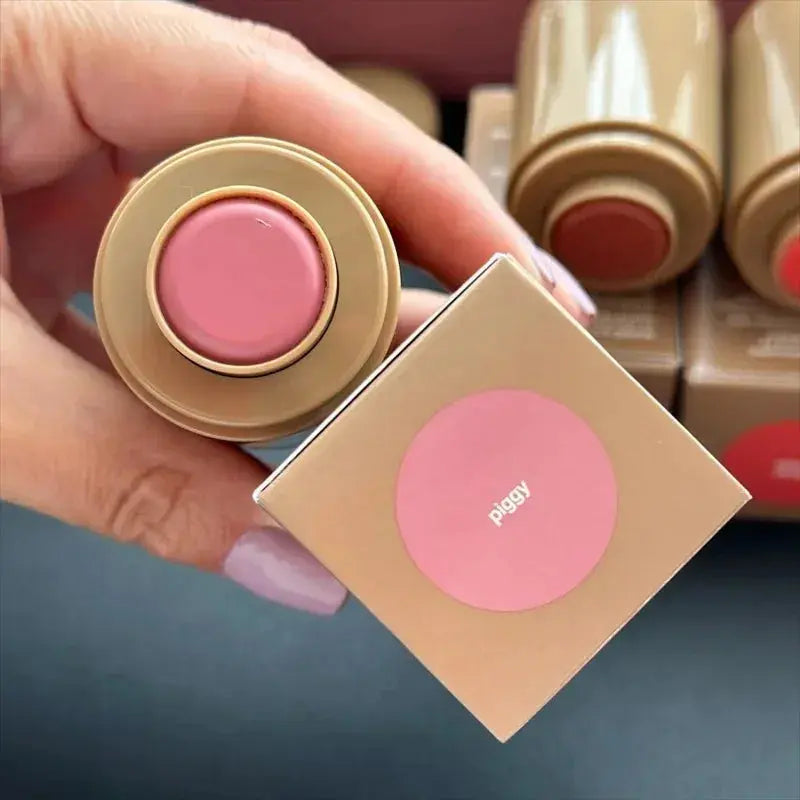 Rhode lip glaze lip gloss in pink circular cap with matching tube