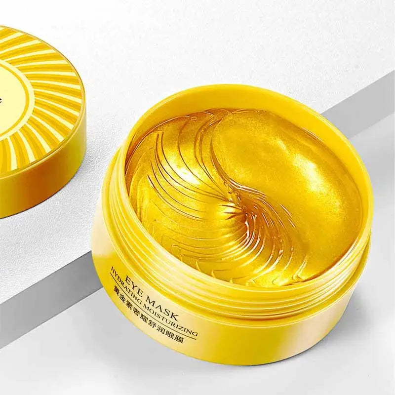 Gold eye mask gel jar, open with swirled gel