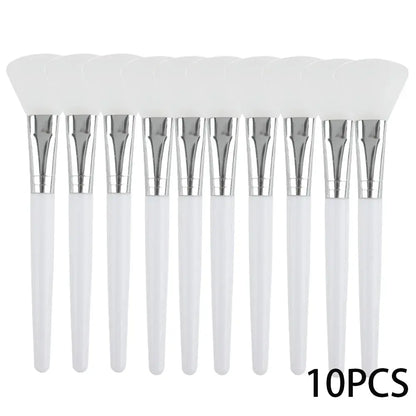 Set of 10 silicone face mask applicator brushes with white handles and silver tips