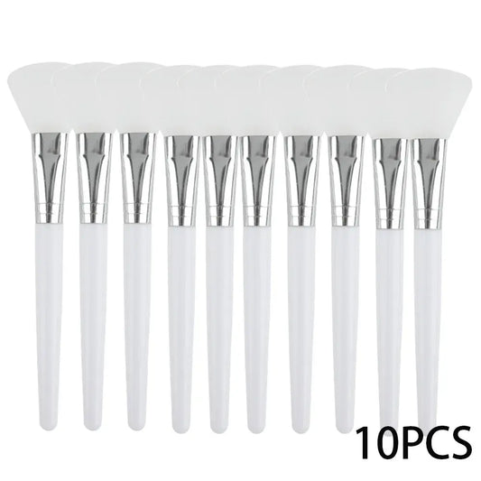 Set of 10 silicone face mask applicator brushes with white handles and silver tips