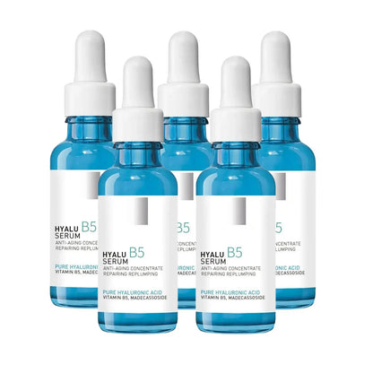 Multiple Hyalu B5 serum bottles arranged together with blue droppers
