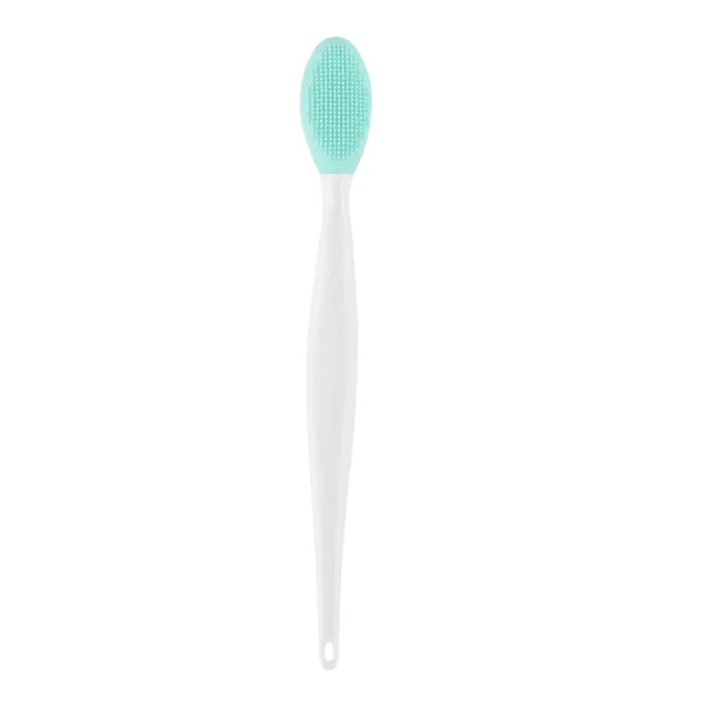 Mint green silicone nose cleaning brush with white handle