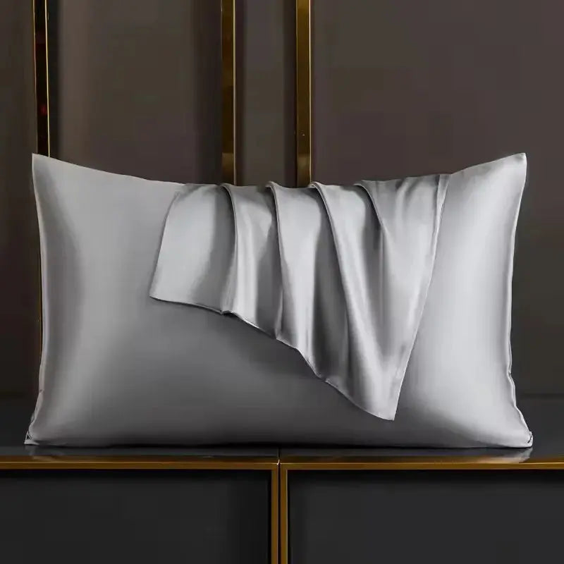 Silver-grey satin pillowcase with curved pleated flap detail