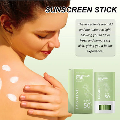 Woman applying SPF 50+ sunscreen stick on skin with Jasmine green tubes
