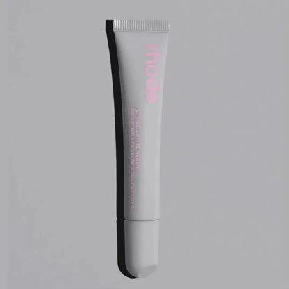 Rhode lip glaze lip gloss in light gray tube with applicator tip