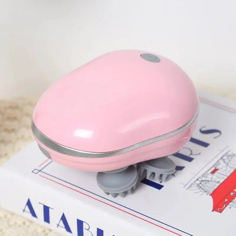 Pink scalp massager with dome head and soft silicone kneading nodes