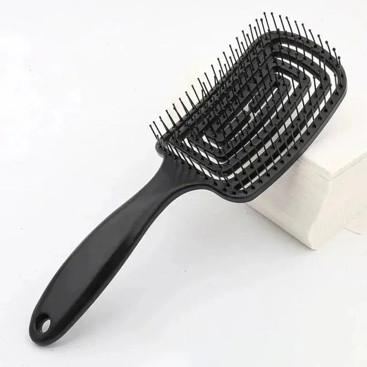Black anti-static massage hair brush comb with flexible bristles and curved handle