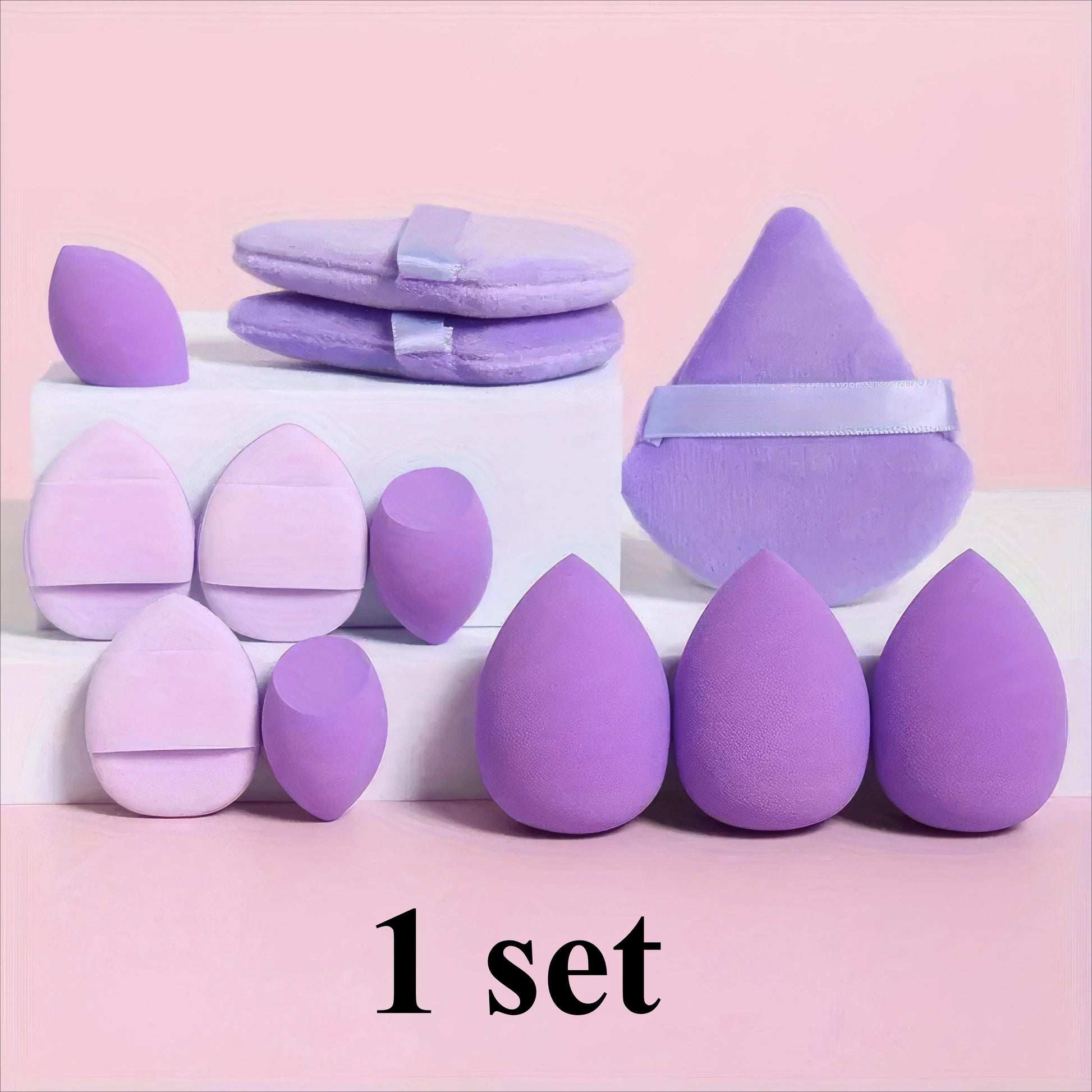 Purple and light purple egg-shaped makeup sponges arranged in a group.