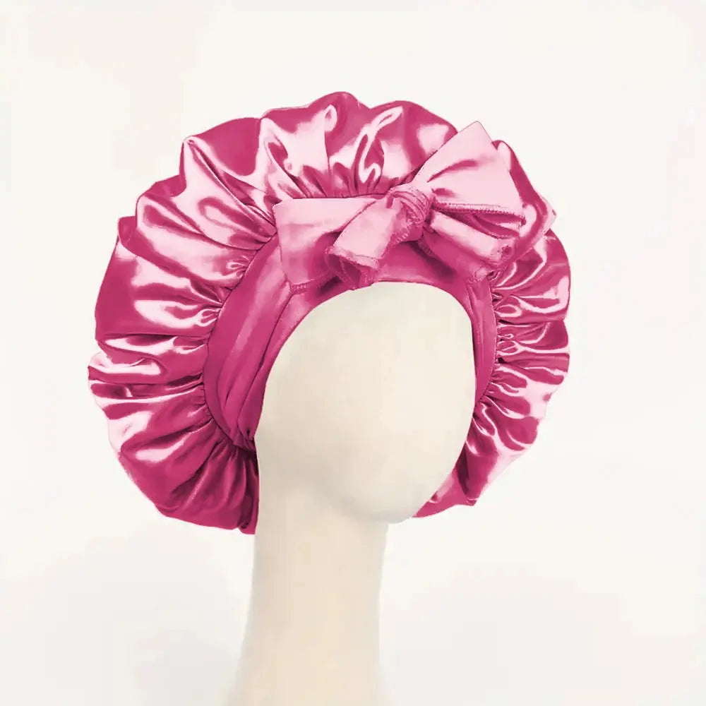 Magenta satin sleep bonnet with ruched crown and tie band
