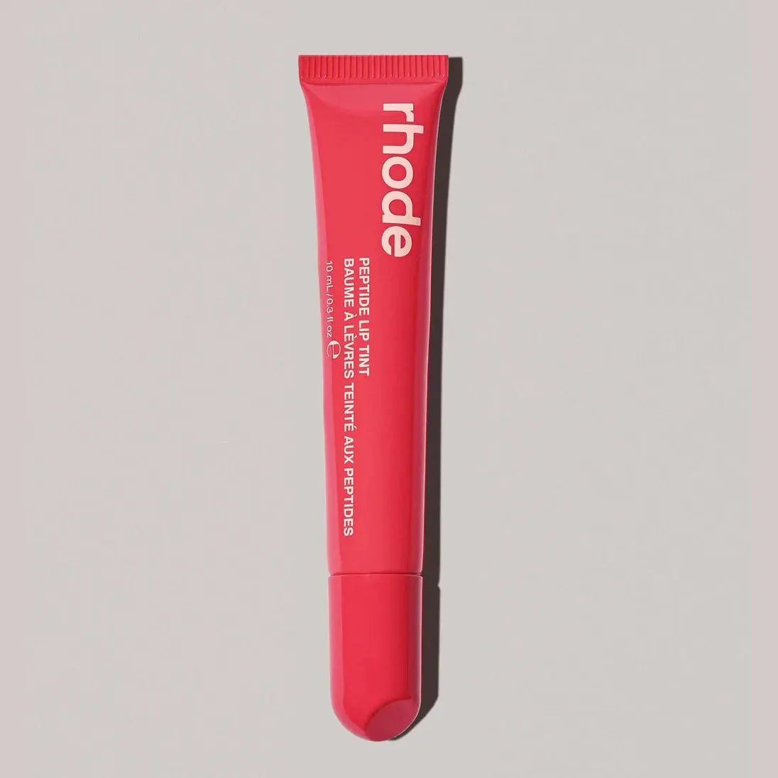 Rhode lip glaze lip gloss in red tube with applicator tip