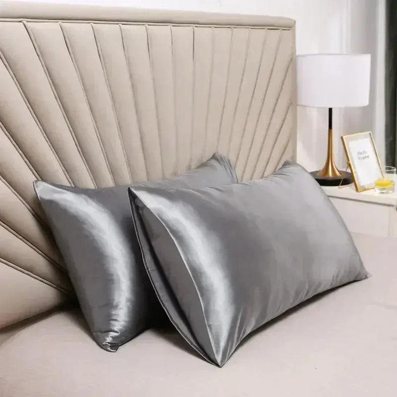 Silver gray satin silk pillow case pair with smooth sheen and folded edges