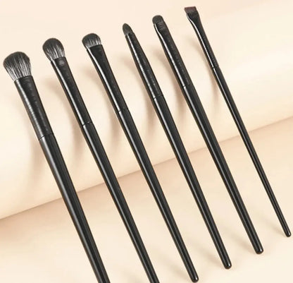 Eye makeup brush set with 6 dark-handled brushes and soft bristles, side angle