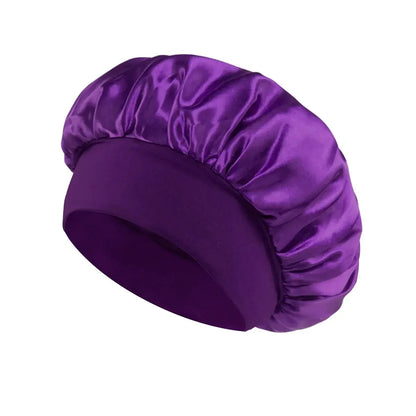 Satin sleeping hair bonnet, wide-brim style in deep purple with soft elastic band