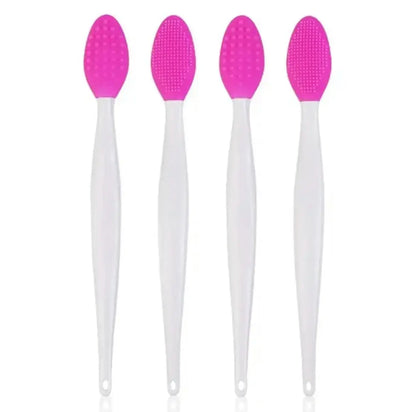Set of four magenta silicone nose cleaning brushes with white handles