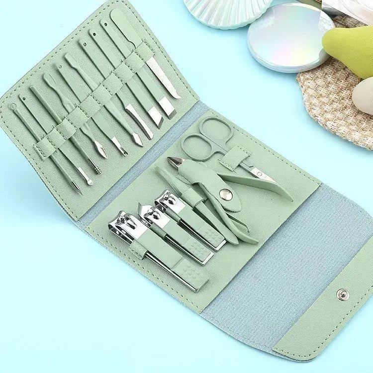 Sage green nail tool set pouch open, showing stainless steel manicure tools