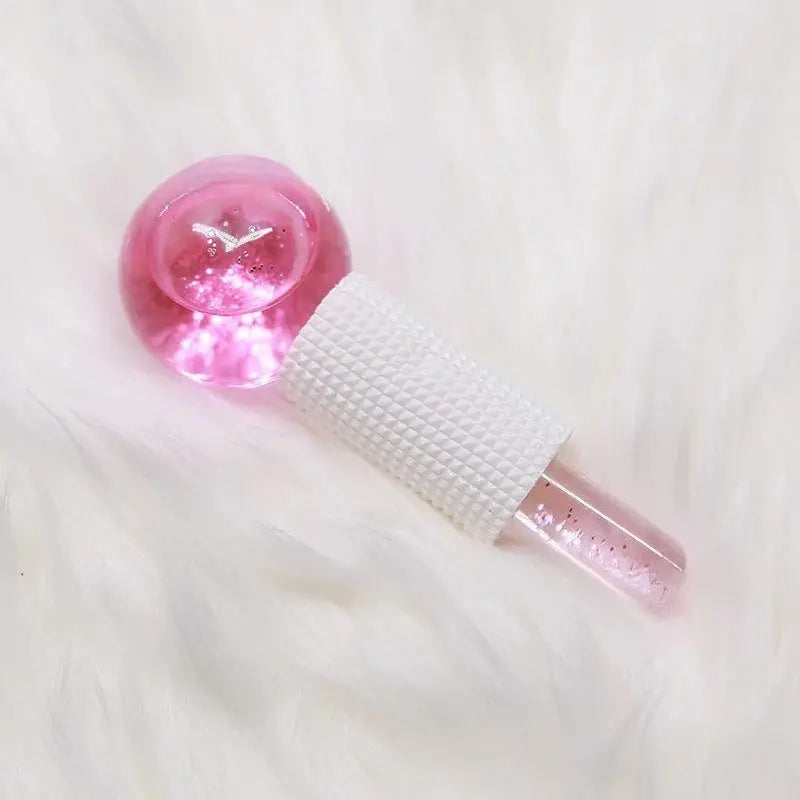 Pink glitter ice crystal ball facial roller set with textured white handle, 2-piece pair