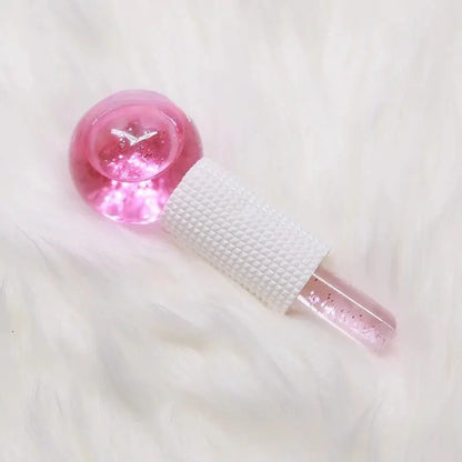 Pink glitter ice crystal ball facial roller set with textured white handle, 2-piece pair